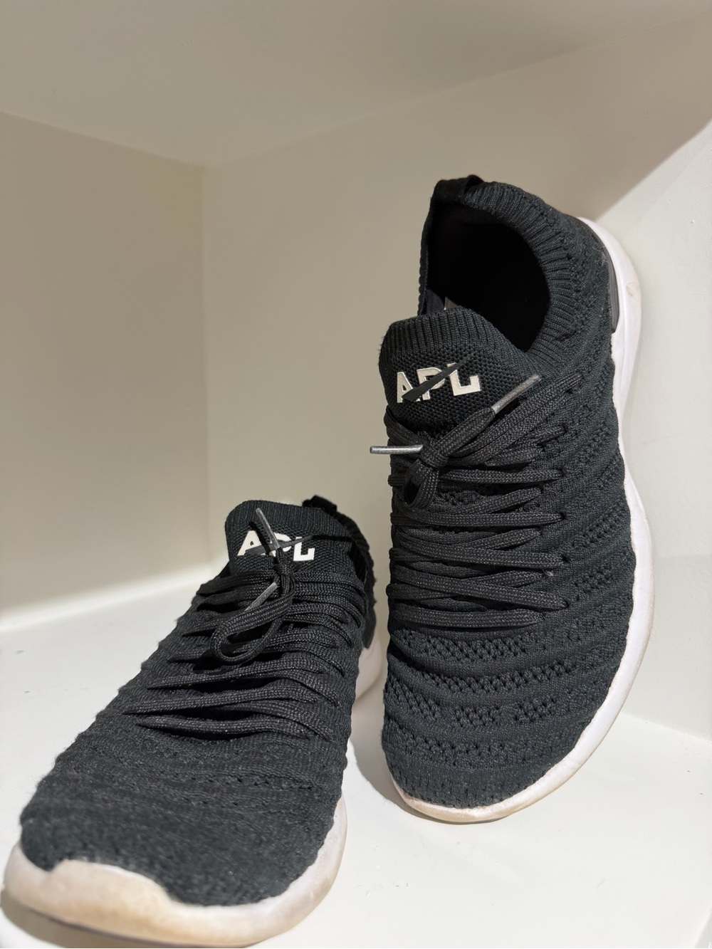 APL TechLoom Knit Slip-On Sneakers in Black and White